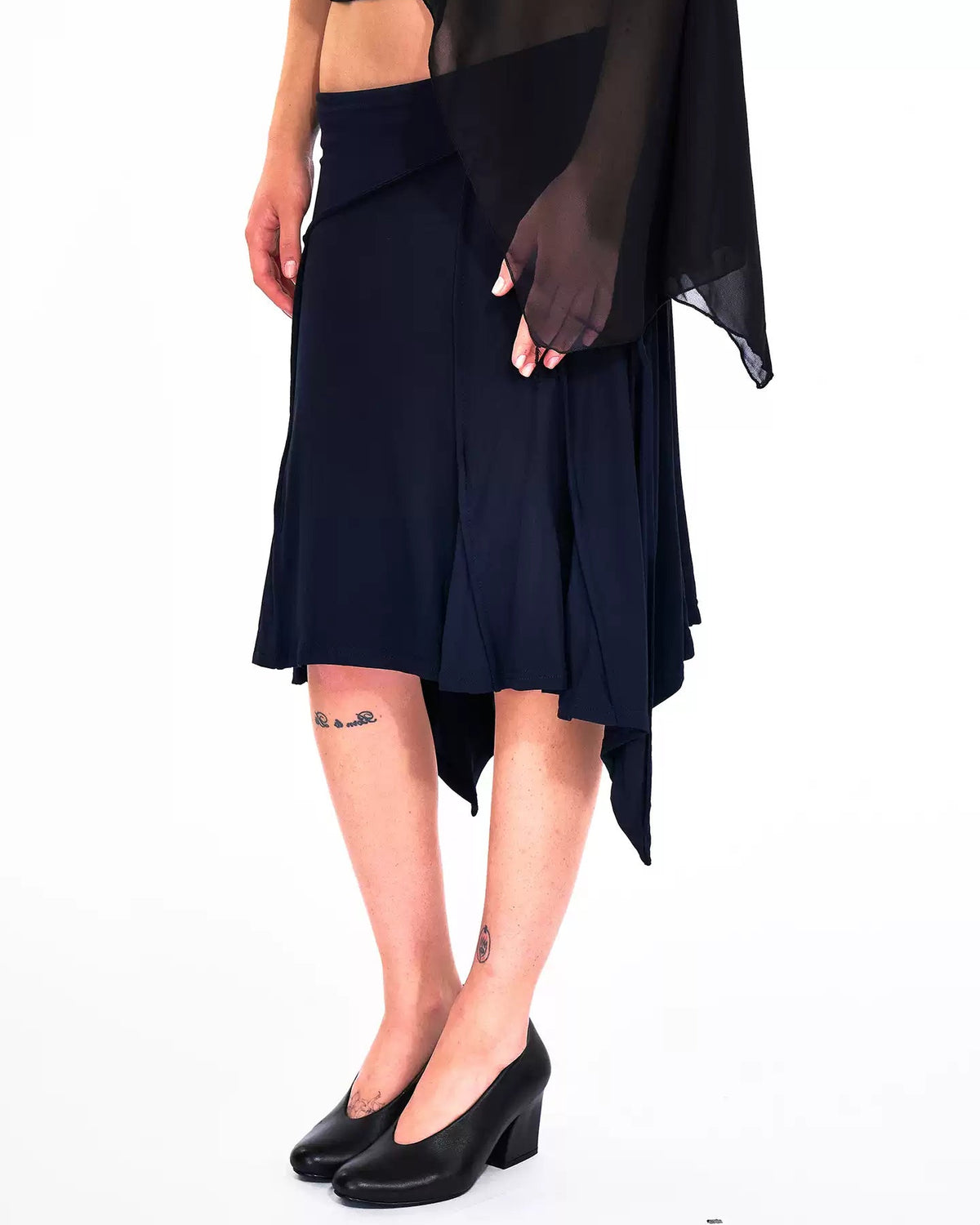 Restless Elegance Asymmetric Low Rise Midi Skirt
