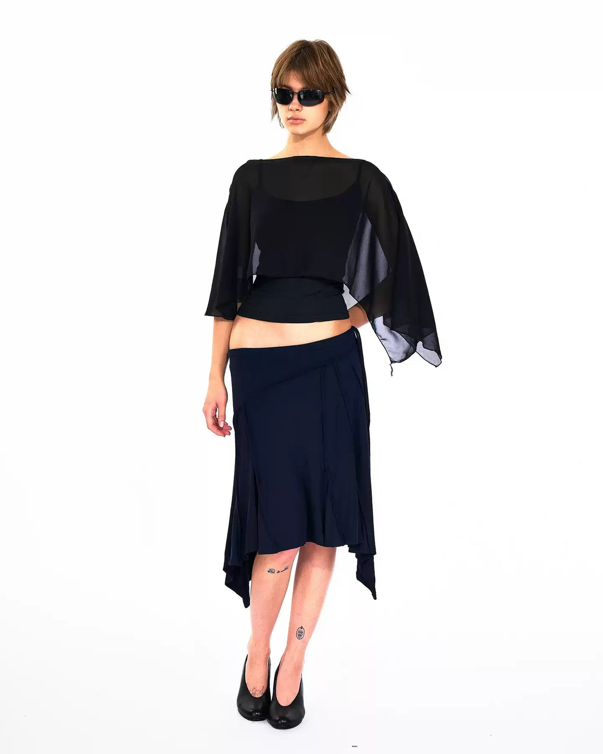 Restless Elegance Asymmetric Low Rise Midi Skirt